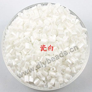 Bugle bead, glass,silver-lined,white ,#1(2x2mm) beads. Sold per pkg of 80 grams,approximately 4,500ps.