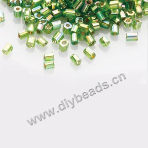 Bugle bead,taiwan, glass, silver-lined and rainbow ,lime green,#1(2x2mm) hex beads. Sold per pkg of 500 grams,approximately 40,000ps 