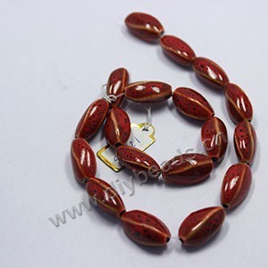 Bead, fancy glaze porcelain, red, 20x12mm twisted oval. Sold per pkg of 20 beads 