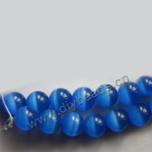 Bead, cat's eye glass,blue , 12mm round, quality grade. Sold per 14.5-inch strand.