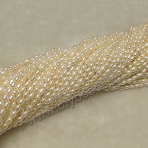 Pearl , cultured freshwater pearl (natural), white , 2-3mm rice,B grade. Sold per pkg of (10) 16-inch strands.