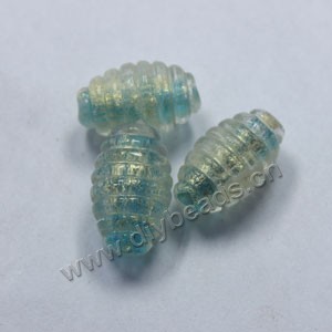 Bead, lampworked glass, blue with gold-colored foil , 20x11mm ribbed oval. Sold per pkg of 500.. Sold per pkg of 500.