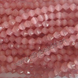 Bead, cat's eye glass,peach, 8x8mm bicones, Sold per 14.5-inch strand.