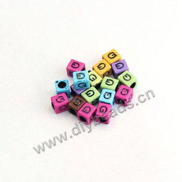 Bead, acrylic,mixed color,alphabet is G, 6x6mm cube with 3mm drill hole. Sold per pkg of 100ps