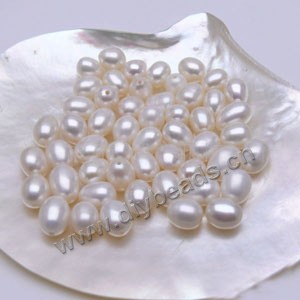 Pearl, cultured freshwater , white, 7-8mm half-drilled rice, AAA grade. Sold per pkg of 1pairs