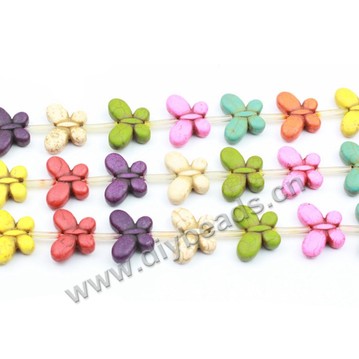 Bead, turquoise (synthetic), 25x35mm butterfly. Sold by per pkg of 10-strands.