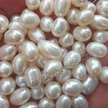 loose Pearl,cultured freshwater,white,8-9mm rice, Agrade. Sold per pkg of one 500g
