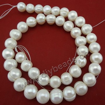 Pearl, cultured freshwater, white,peach, mauve, ,round pearl with deep  screw ,10-11 mm all light, Sold per bag of one strand