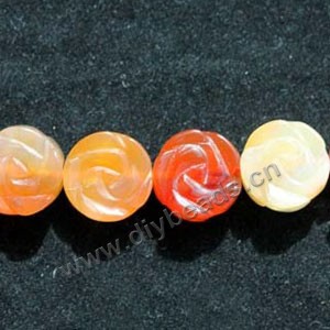 Bead, red agate (heated), 8mm carved double side flower,  Sold per 16-inch strand.