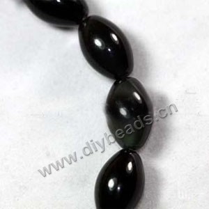 Bead, black agate (dyed),10x16mm oval. Sold per 16-inch strand.