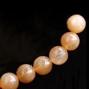 Bead, sunstone (natural), 10mm round. Sold per 16-inch strand.