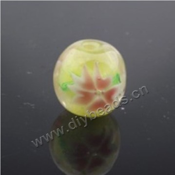 Bead, lampworked glass ,yellow with flower, 14x14mm round.mini order 50pc 