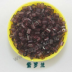 Bugle bead, glass,transparent crystal,violet ,#1(2x2mm) beads. Sold per pkg of 80 grams,approximately 4,500ps.