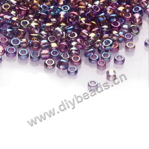 #11 seed beads,glass,purple,rainbow,irregular round.sold per pkg of 1/2 kilo.