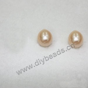 Pearl, cultured freshwater ,peach, 13mm half-drilled rice, AAA grade. Sold per pkg of 1pairs