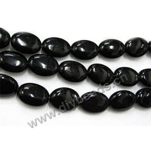 Bead, black agate (dyed), 13x18mm flat oval. Sold per 16-inch strand.