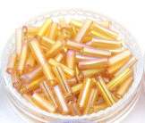 Bugle bead, glass, gold,#3(6x2mm) bugle tube . Sold per pkg of 300 grams, approximately 9,000ps