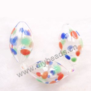 Bead, hand-blown glass, multicolored dots, 26x14mm hollow oval. Sold per pkg of 10