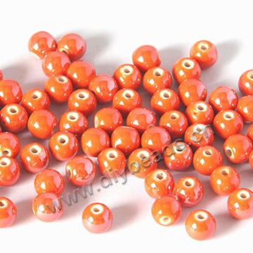 Bead , fancy glaze porcelain,orange, 8mm round. Sold per pkg of 50 beads. 