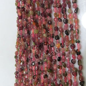 Bead, multi-tourmaline (natural), multicolored, 5x7mm nugget,Mohs hardness 7 to 7-1/2. Sold per 15-inch strand