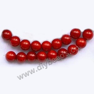 Bead, red coral (imitation), 8mm round. Sold per 15-inch strand.