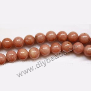 Bead, rhodonite (natural), 8mm round. Sold per 15-inch strand