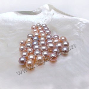 Pearl, cultured freshwater , peach/mauve, 5-5.5mm half-drilled round, AAA grade. Sold per pkg of 4pairs