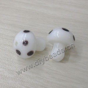Bead, lampworked glass, black and white, 10x12mm mushroom with spots. Sold per pkg of 20 beads.