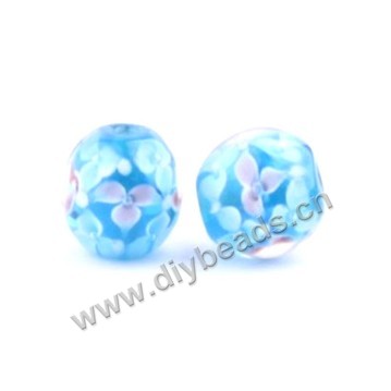 Bead, lampworked glass,blue with flower, 16x16mm round.mini order 50pc 