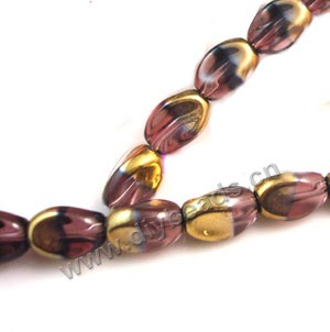 Bead ,copper-plated glass, liac, 13x10mm twisted oval. Sold per pkg of ten 30cm strand.