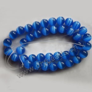 Bead, cat's eye glass,blue ,8mm round, quality grade. Sold per 14.5-inch strand.