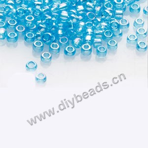 #11 seed beads,glass,light aqua,rainbow,irregular round.sold per pkg of 1/2 kilo.
