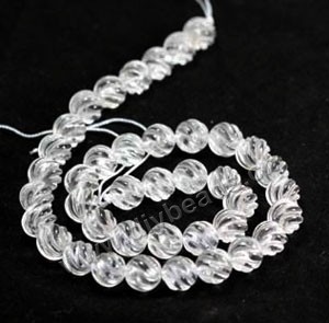 Bead,clear quartz crystal (natural), 10mm carved round to bring good lucky. Sold per 16-inch strand