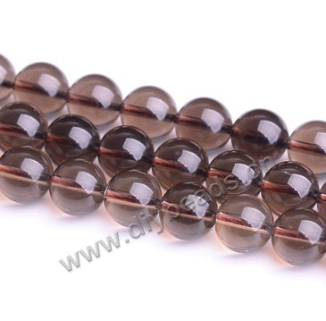 Bead, smoky quartz (heated/irradiated), 20mm round. Sold per 15-inch strand